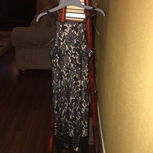 A black & tan laced dress.
